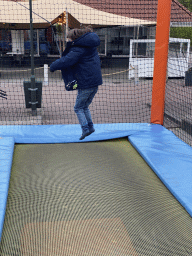 Max on the trampoline at the playground at the central square of Holiday Park AquaDelta