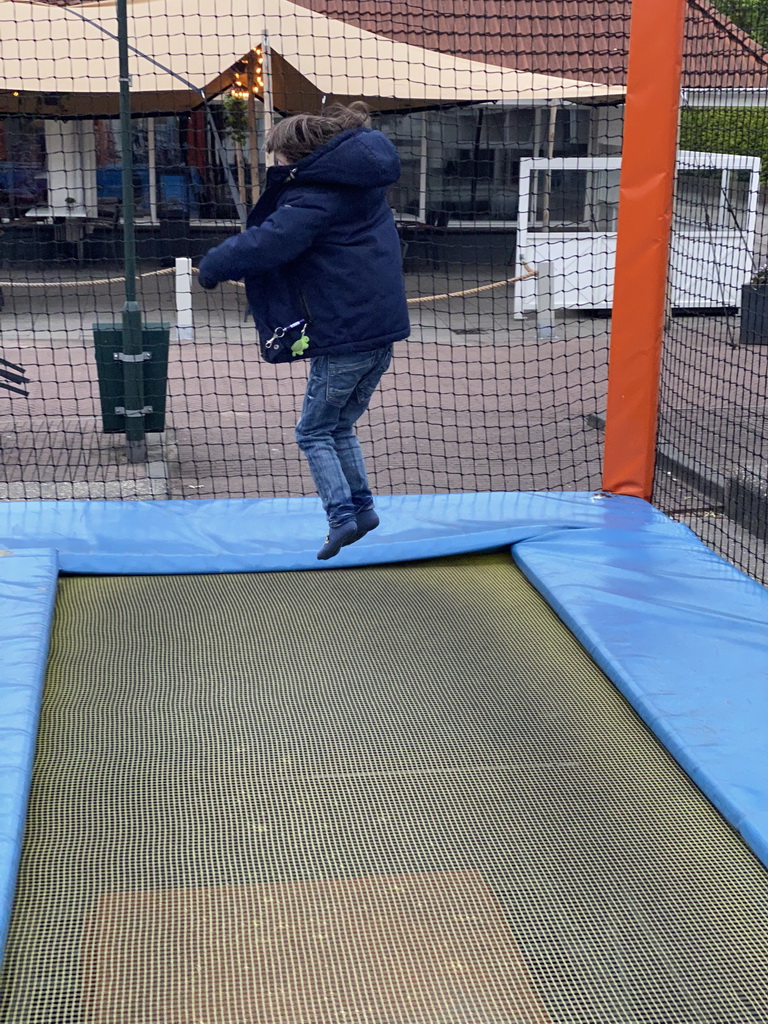 Max on the trampoline at the playground at the central square of Holiday Park AquaDelta