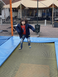 Max on the trampoline at the playground at the central square of Holiday Park AquaDelta
