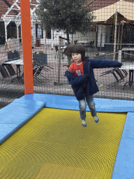 Max on the trampoline at the playground at the central square of Holiday Park AquaDelta