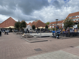 The central square of Holiday Park AquaDelta with the front of the Brasserie