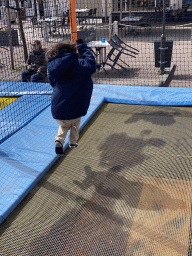 Max on the trampoline at the playground at the central square of Holiday Park AquaDelta