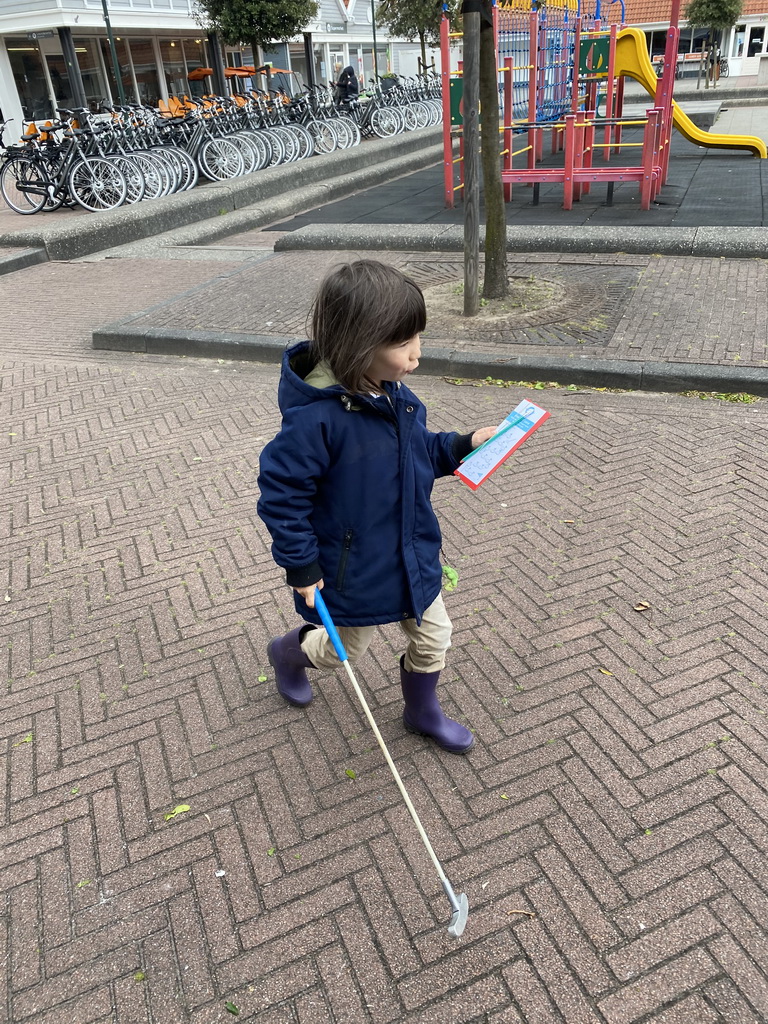 Max walking from the central square to the minigolf court of Holiday Park AquaDelta