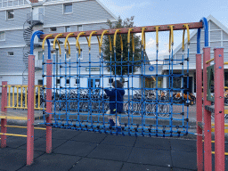 Max on a rope bridge at the playground at the central square of Holiday Park AquaDelta