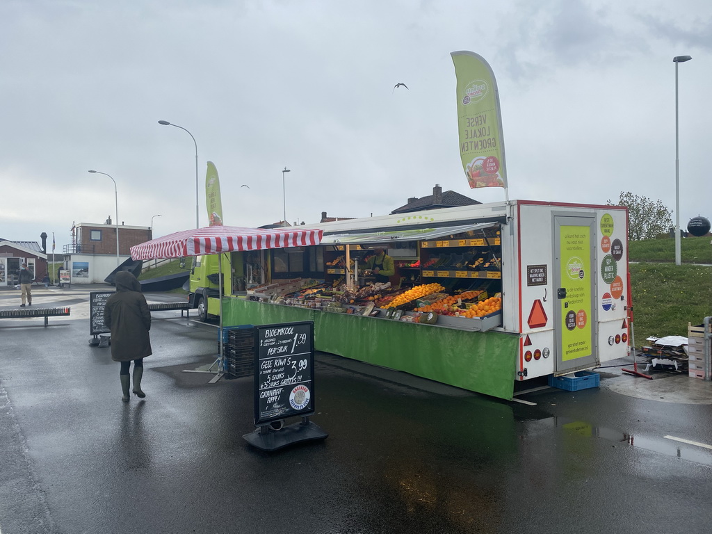 Market stall with vegetables at the Havenkade street