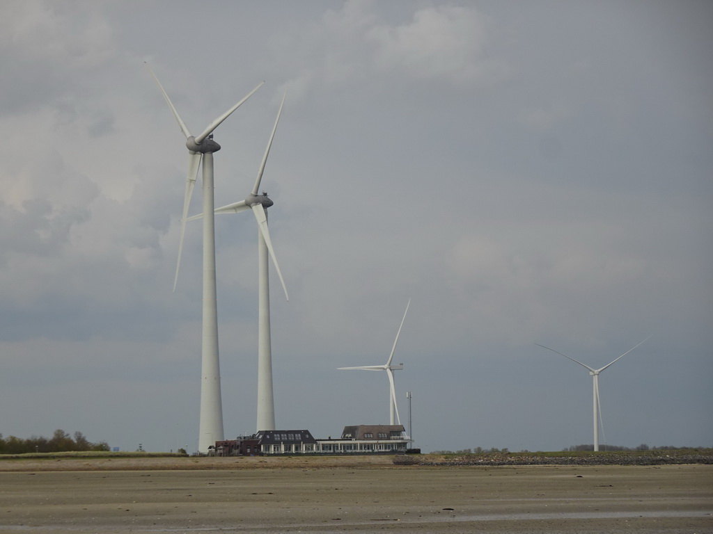 The beach, windmills and the Restaurant Grevelingen at the south side of the Grevelingendam