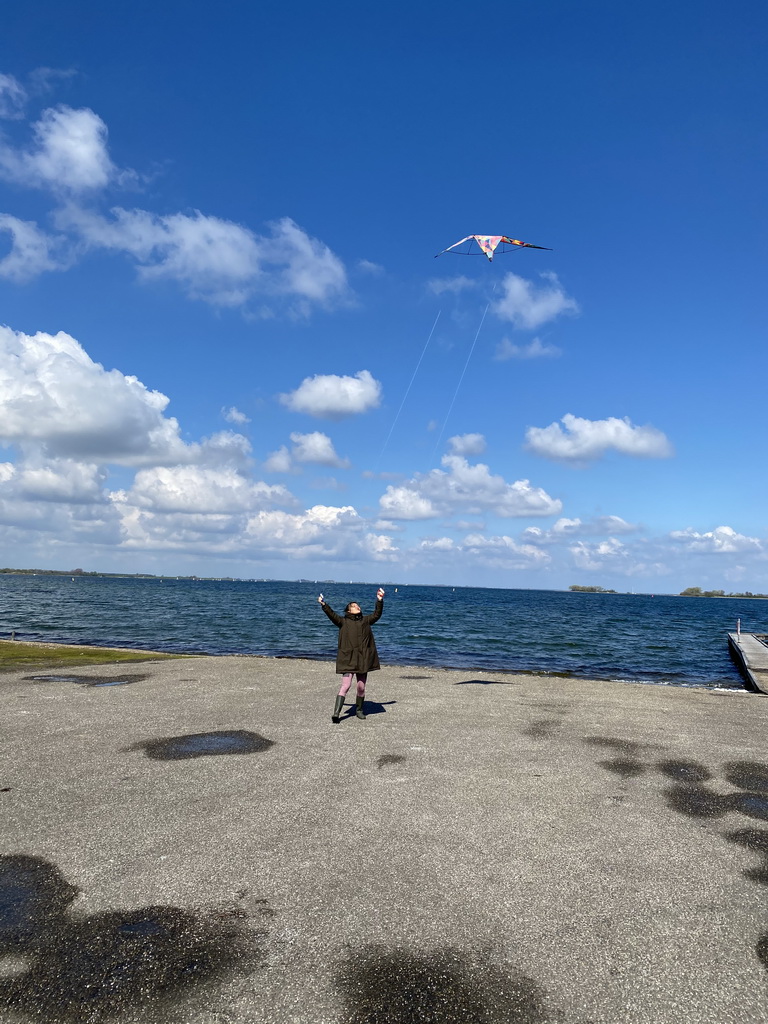 Miaomiao flying a kite at the northwest side of the Grevelingendam