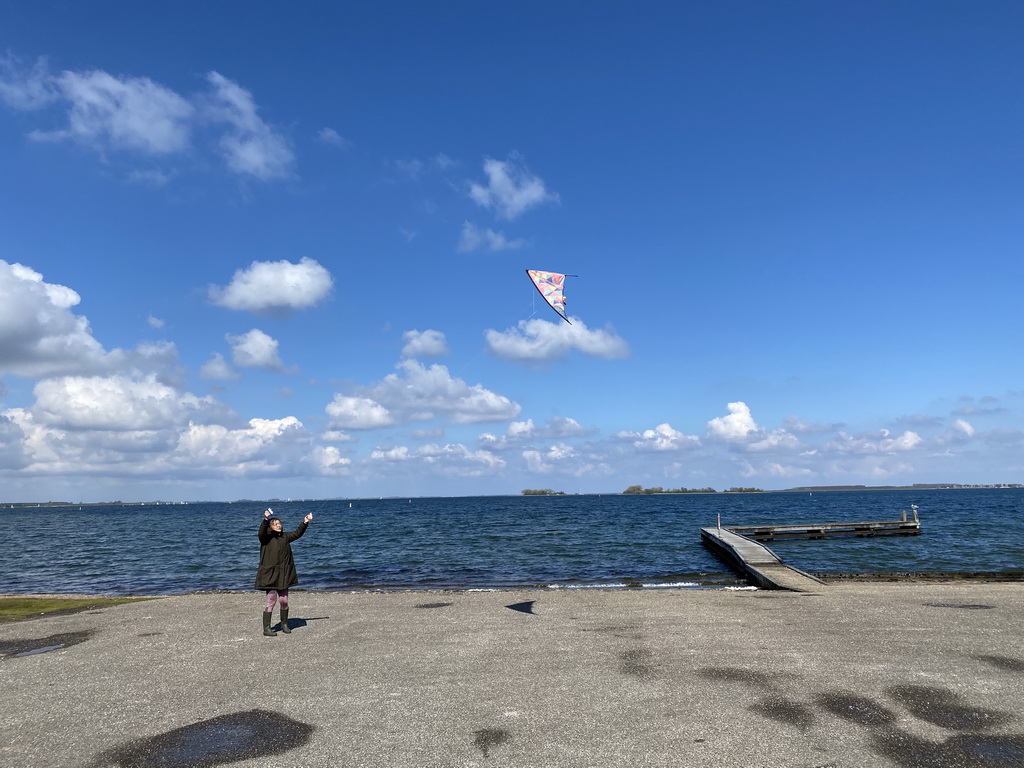 Miaomiao flying a kite at the northwest side of the Grevelingendam