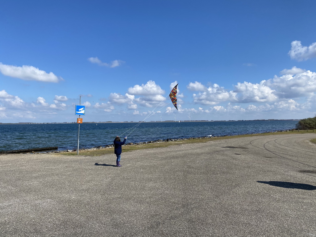 Max flying a kite at the northwest side of the Grevelingendam