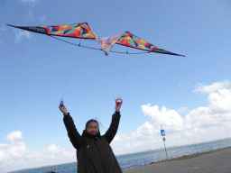 Miaomiao flying a kite at the northwest side of the Grevelingendam
