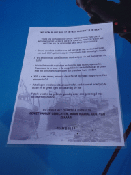 Paper with COVID-19 rules at the terrace of the Bru 17 restaurant