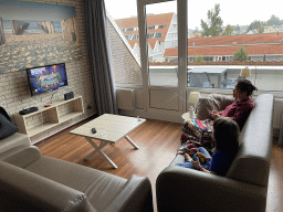 Miaomiao and Max playing Overcooked in the living room at the upper floor of our apartment at Holiday Park AquaDelta