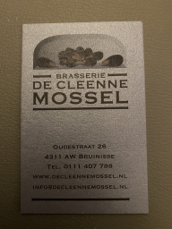 Front side of the business card of the Brasserie De Cleenne Mossel restaurant