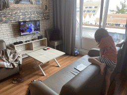 bruinisse_14_075 - 284 kb - 1024x768 - Max watching iPad in the living room at the upper floor of our apartment at Holiday Park AquaDelta, with the 2020 Olympics on television Max watching iPad in the living room at the upper floor of our apartment at Holiday Park AquaDelta, with the 2020 Olympics on television