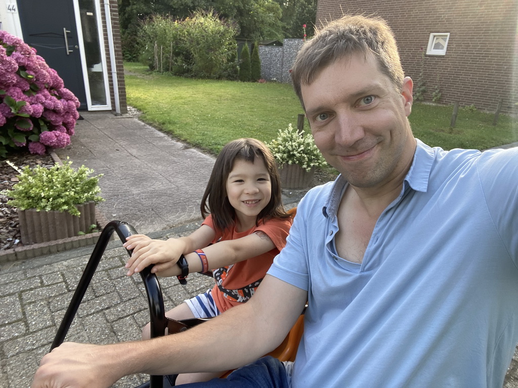 Tim and Max on a tricycle at the Kreek op Aquadelta holiday park