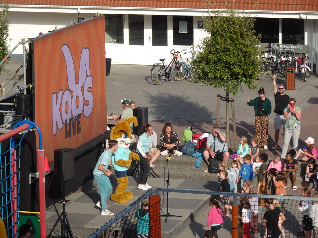 The mascot Koos Konijn at the central square of Holiday Park AquaDelta, viewed from the balcony of the upper floor of our apartment