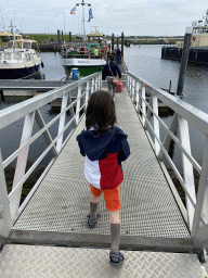 Miaomiao and Max walking to the Seal Safari boat in the Harbour of Bruinisse