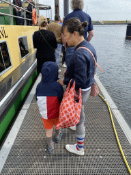 Miaomiao and Max waiting in line for the Seal Safari boat in the Harbour of Bruinisse