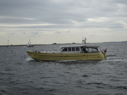 The Cygnus boat on the Keeten-Mastgat estuary, viewed from the Seal Safari boat