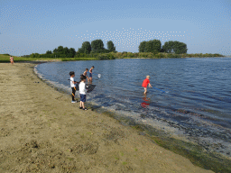 Max and his friends catching jellyfish and crabs on a beach at the north side of the Grevelingendam
