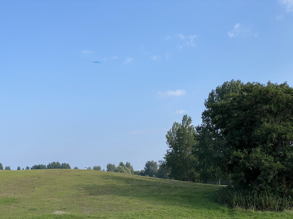 Our kite flying above a hill at the north side of the Grevelingendam