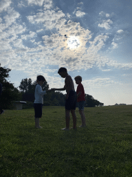Max and his friends flying a kite on a hill at the north side of the Grevelingendam