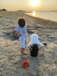 Max and his friend catching fishes on a beach at the north side of the Grevelingendam