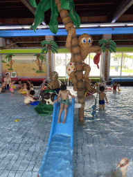 Max on the slide at the children`s pool at the swimming pool at Holiday Park AquaDelta