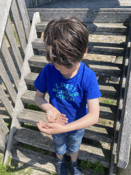 Max with a ladybug at the playground of Restaurant Grevelingen at the south side of the Grevelingendam