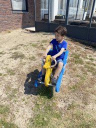 Max on a seesaw at the playground of Restaurant Grevelingen at the south side of the Grevelingendam