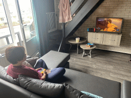 Miaomiao playing the Nintendo Switch game `Immortals Fenyx Rising` in the living room at the lower floor of our apartment at Holiday Park AquaDelta