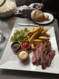 Steak, fries and vegetables at the Brasserie De Cleenne Mossel restaurant