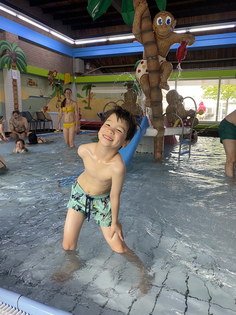 Max at the children`s pool at the swimming pool at Holiday Park AquaDelta