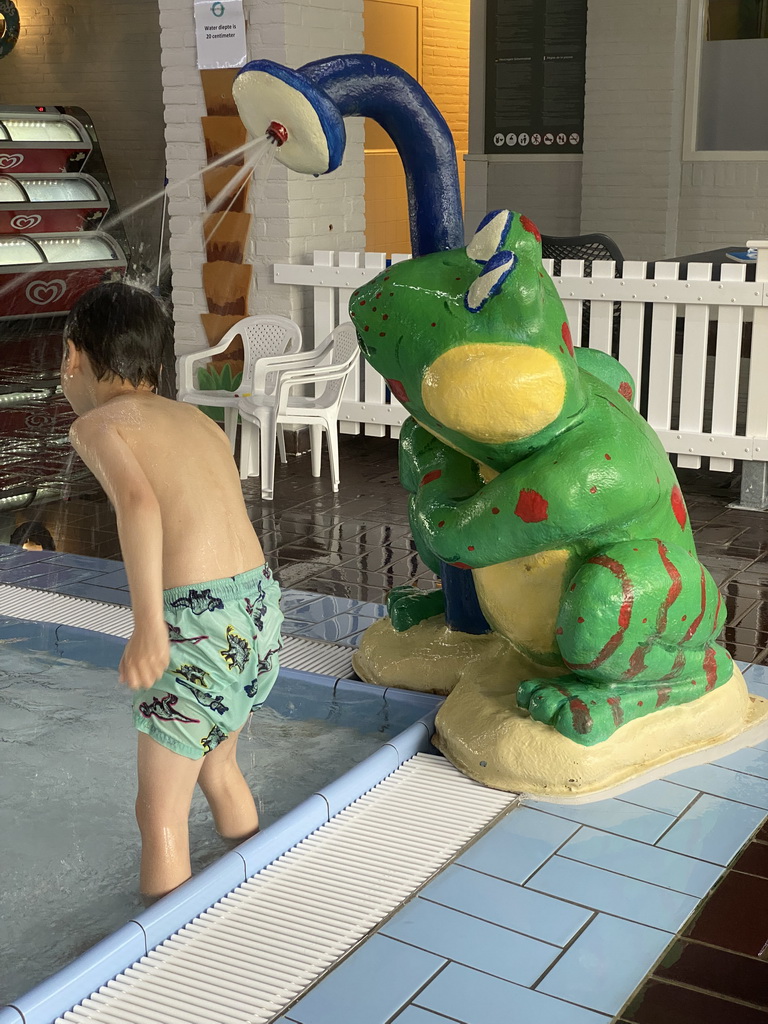 Max at the children`s pool at the swimming pool at Holiday Park AquaDelta