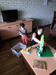 Miaomiao and Max playing with Duplo in the living room at the ground floor of our apartment at Holiday Park AquaDelta