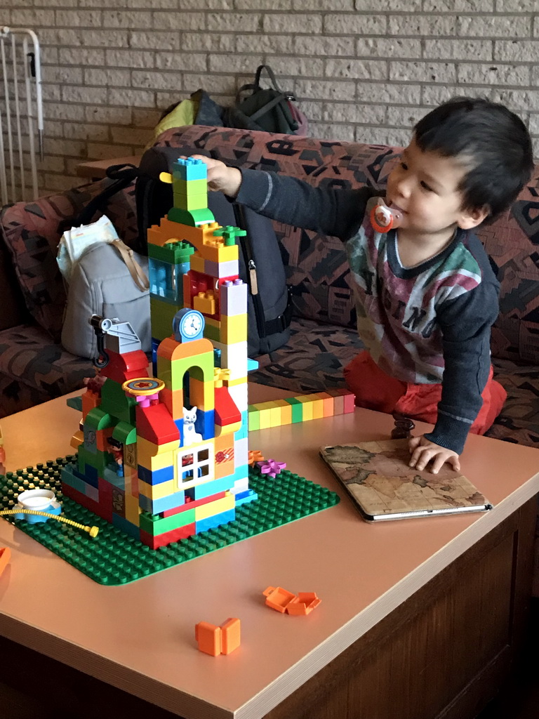 Max playing with Duplo in the living room at the ground floor of our apartment at Holiday Park AquaDelta