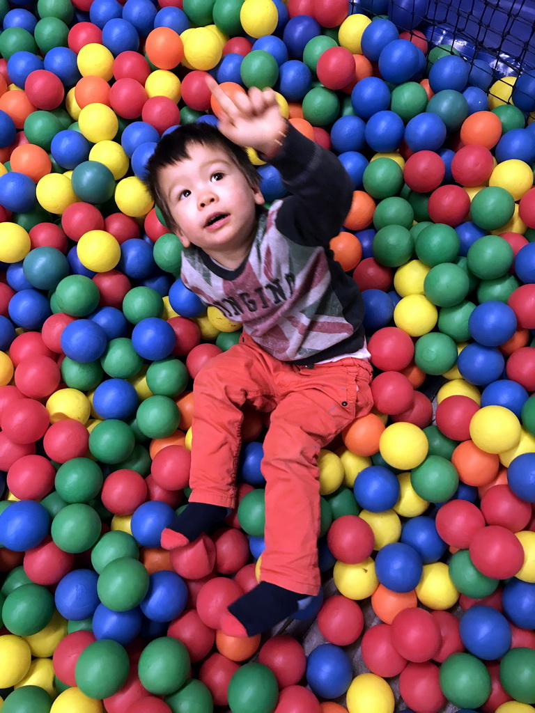 Max playing in the ball pit at the Kinderland playground at Holiday Park AquaDelta