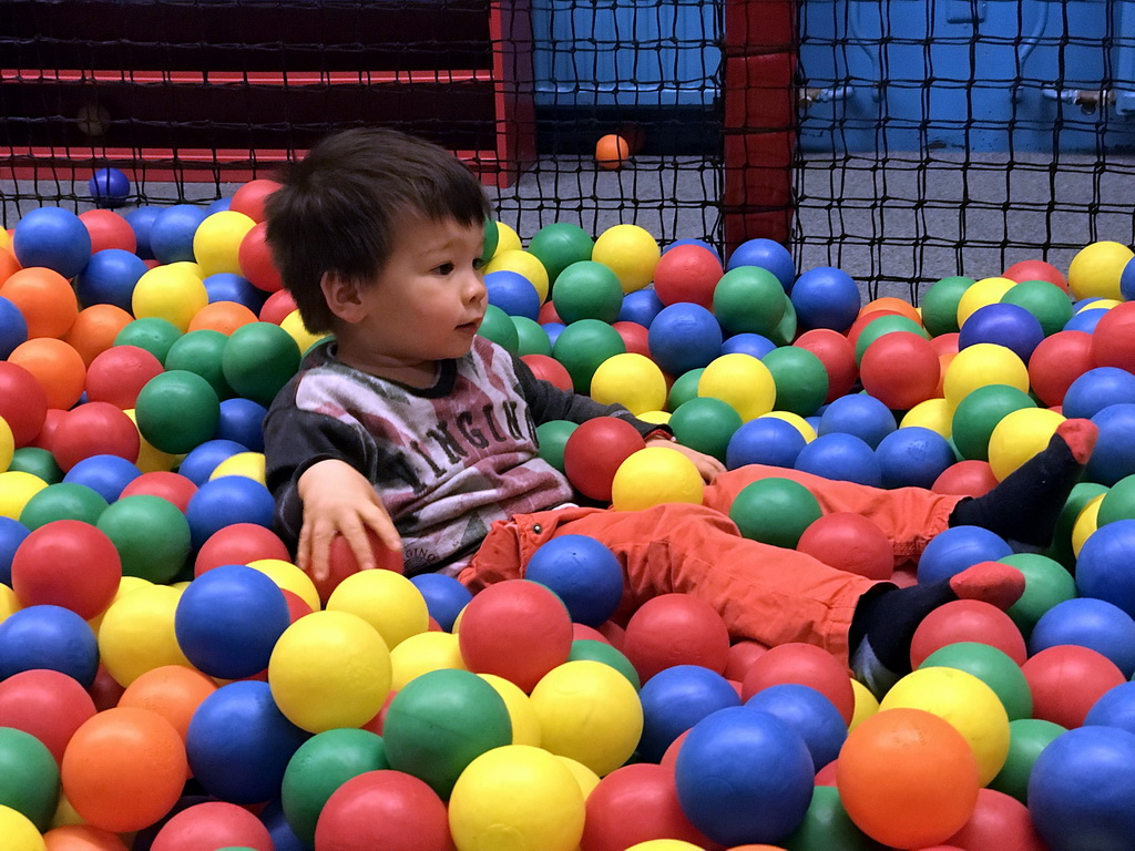 Max playing in the ball pit at the Kinderland playground at Holiday Park AquaDelta