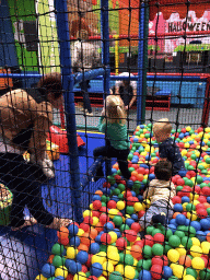 Max playing in the ball pit at the Kinderland playground at Holiday Park AquaDelta