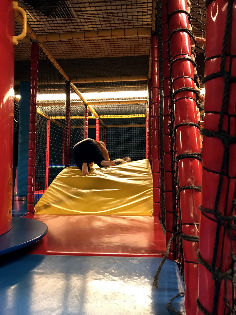 Miaomiao and Max playing at the climbing rack at the Kinderland playground at Holiday Park AquaDelta