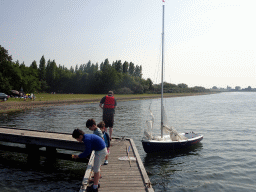 Boat on the Grevelingenmeer lake, viewed from a pier at the northwest side of the Grevelingendam