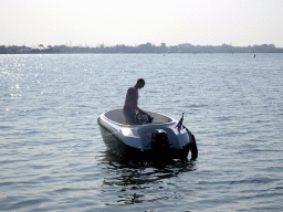 Boat on the Grevelingenmeer lake, viewed from a pier at the northwest side of the Grevelingendam