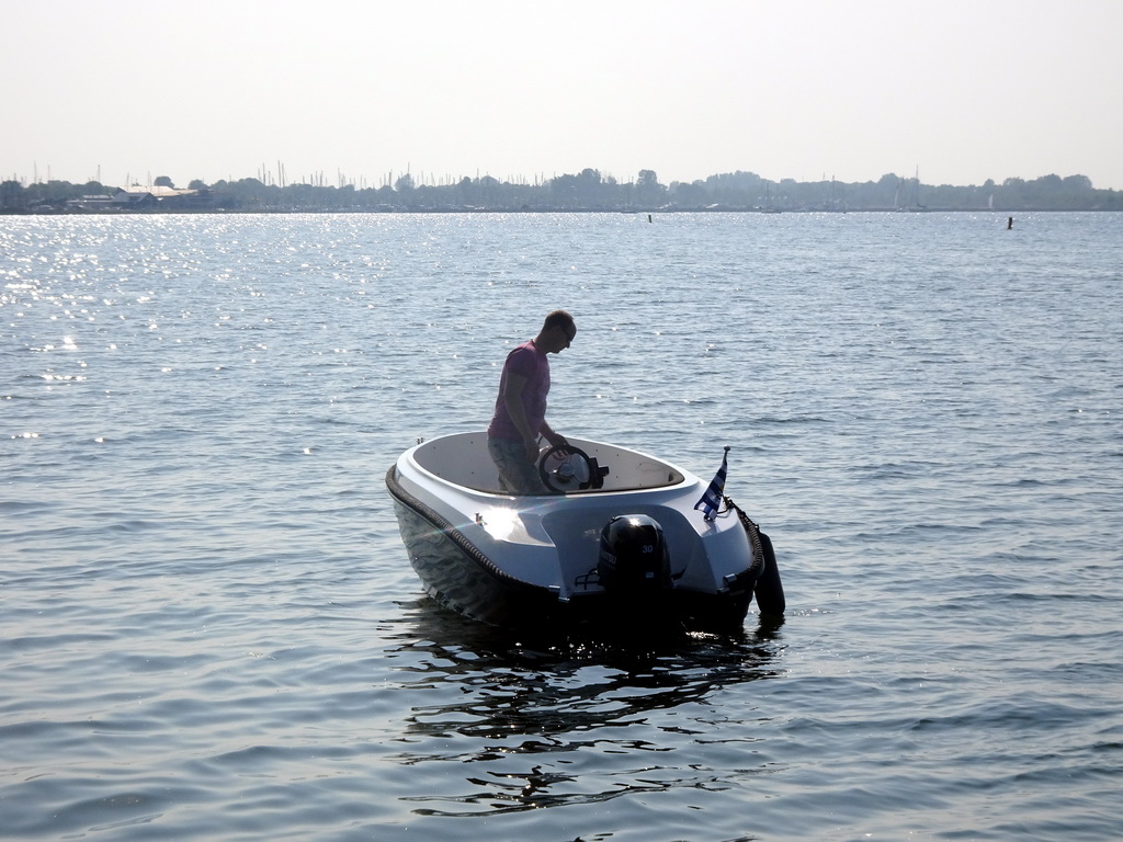 Boat on the Grevelingenmeer lake, viewed from a pier at the northwest side of the Grevelingendam