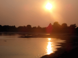 The Krammer lake and the beach at the southwest side of the Grevelingendam, viewed from Restaurant Grevelingen, at sunset