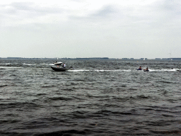 Boats and water skiers on the Grevelingenmeer lake, viewed from the northwest side of the Grevelingendam