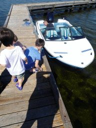 Max and friends catching crabs on a pier and a boat at the northwest side of the Grevelingendam