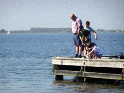 Our friends catching crabs on a pier at the northwest side of the Grevelingendam