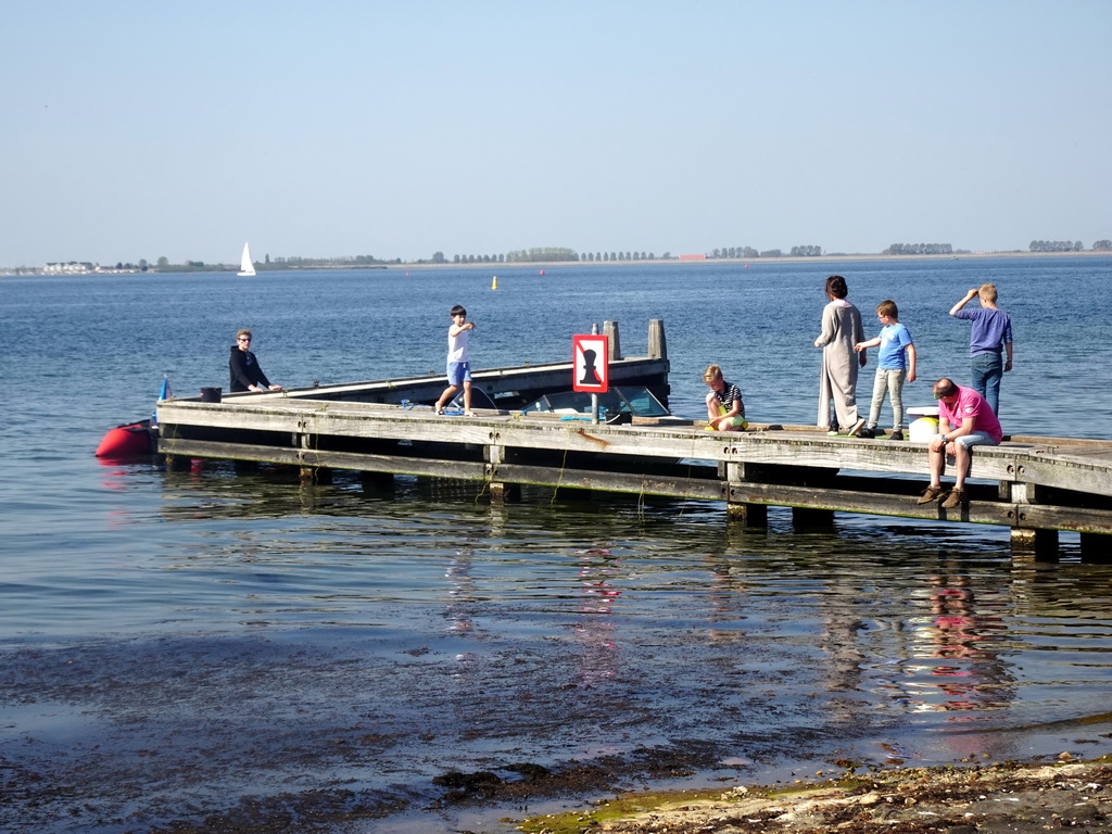 Our friends catching crabs on a pier at the northwest side of the Grevelingendam