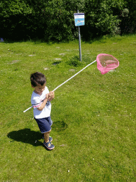 Max with a fishing net at the northwest side of the Grevelingendam