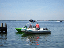 Boat on the Grevelingenmeer lake, viewed from the northwest side of the Grevelingendam